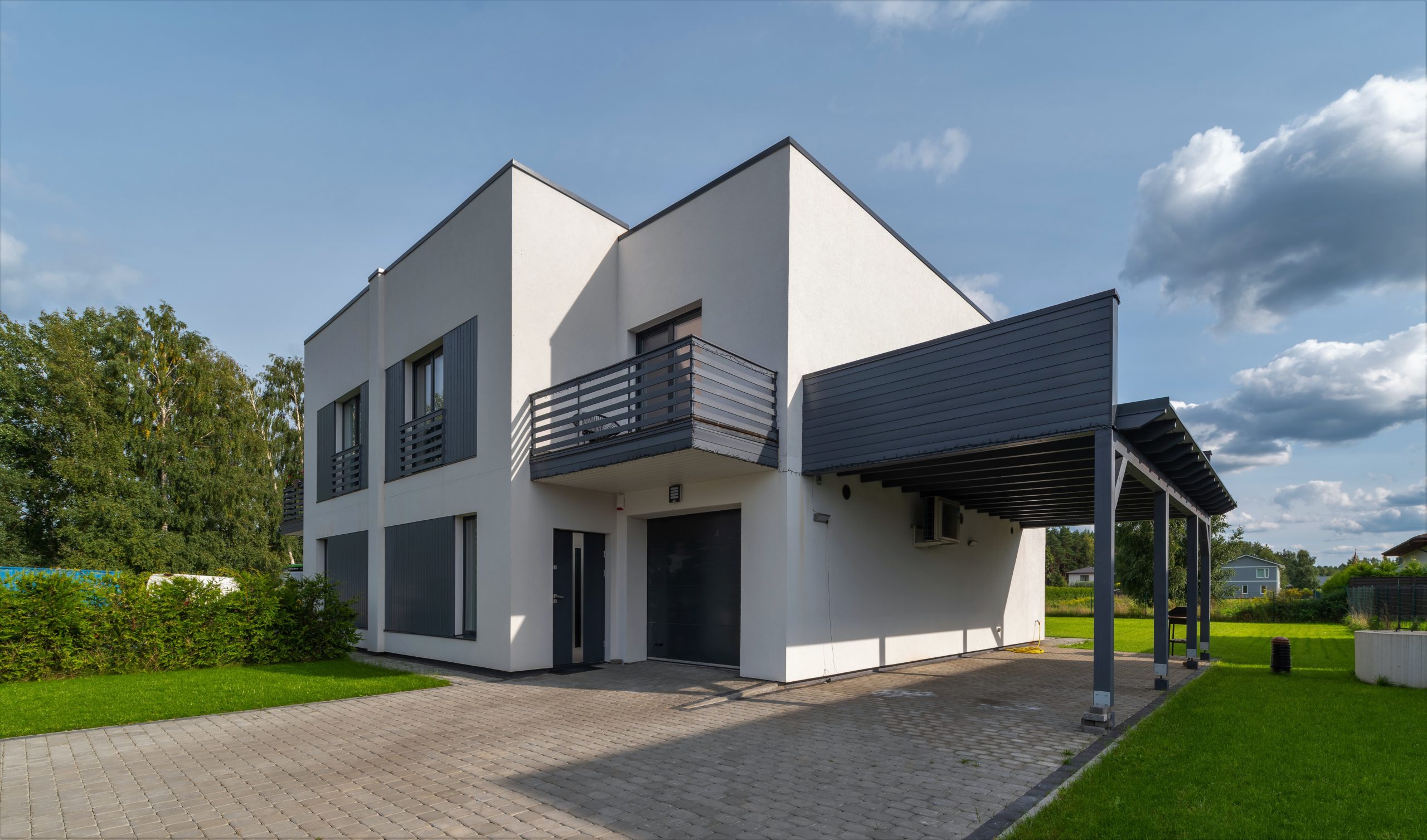 Exterior of modern luxury private house. Garage entrance.